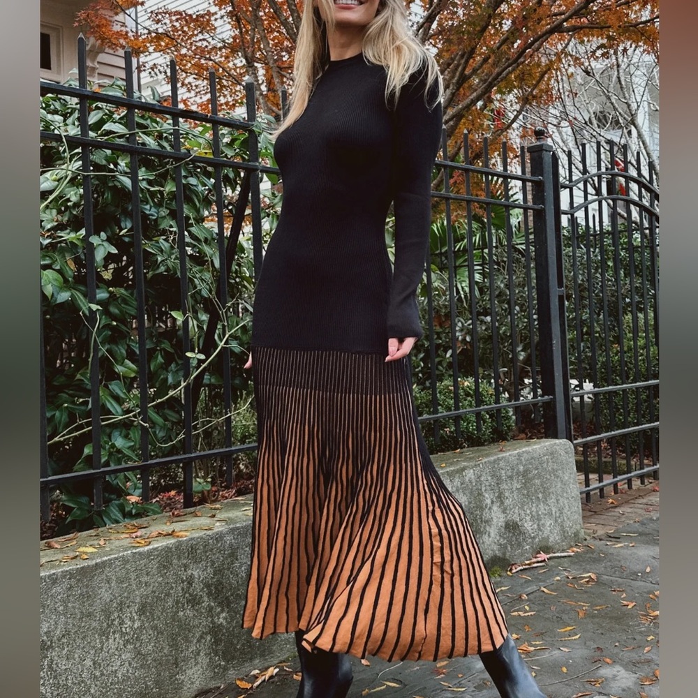 Vail maxi
Brand new with tags 
Black long sleeve maxi dress winter fall